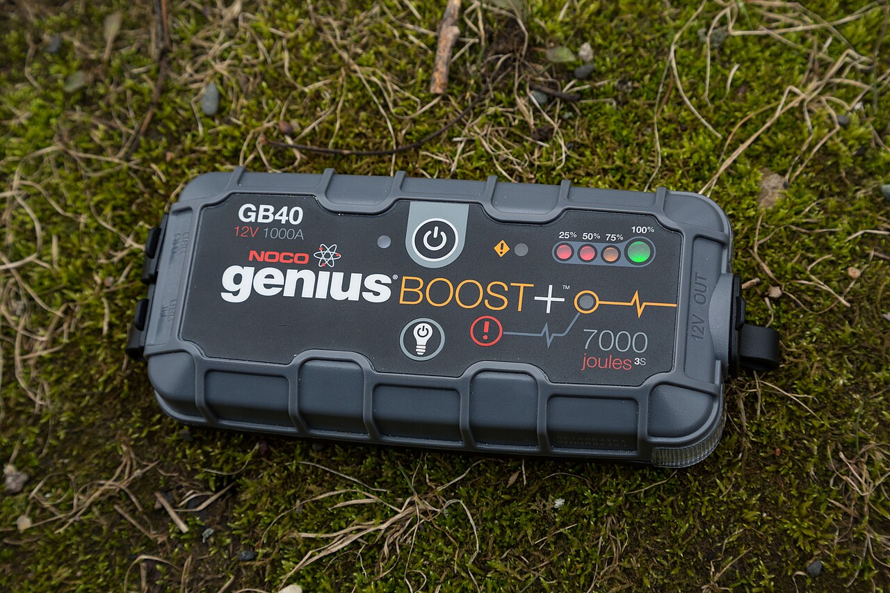 Portable automotive jump starter